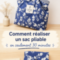 Sac de courses pliable en tissu coloré posé sur une table.