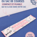 Photo d'un sac de voyage pliable posé sur une table en couture, prêt à être utilisé.