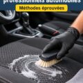 Une professionnelle effectue un nettoyage approfondi d'une voiture avec des outils spécialisés.